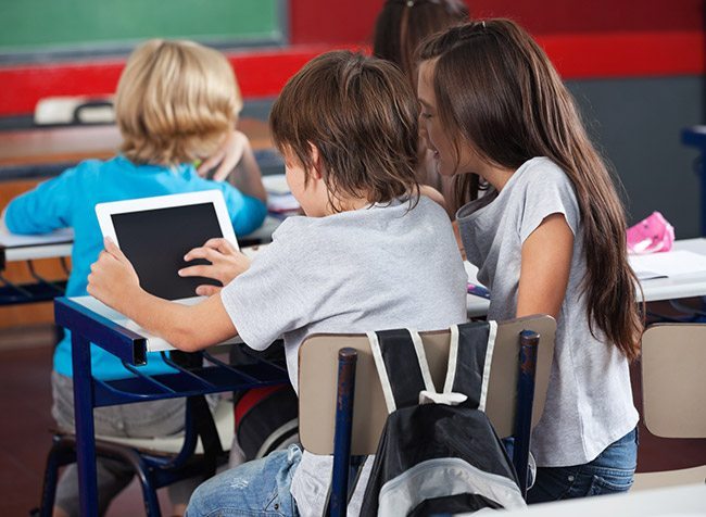 online-printing-kids-classroom-projects-school-children-using-tablet