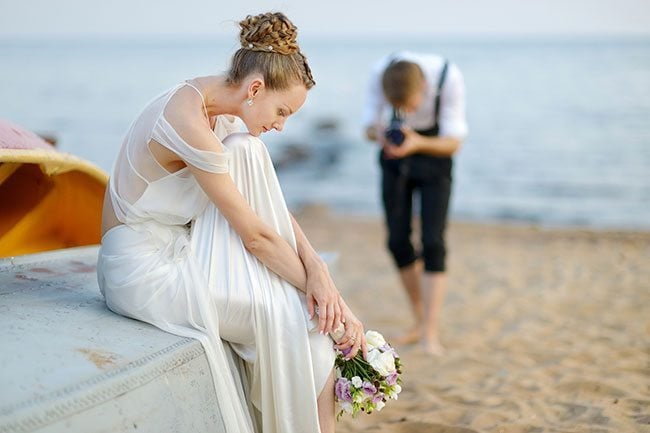 Hiring A Quality Wedding Photographer - Bride Being Photographed