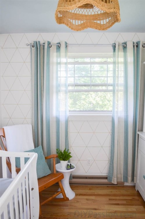 Budget Friendly Bedroom Decorating Ideas - Geometric Statement Wall With Aqua Accents