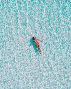 Drone woman pool